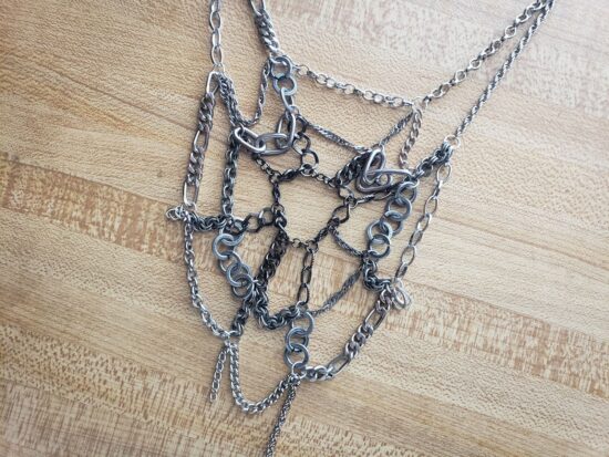 silver tone gradient scrap chain spiderweb necklace (15")